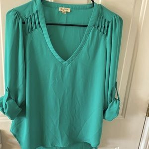 women’s lightweight, V-neck blouse, adjustable sleeves, turquoise